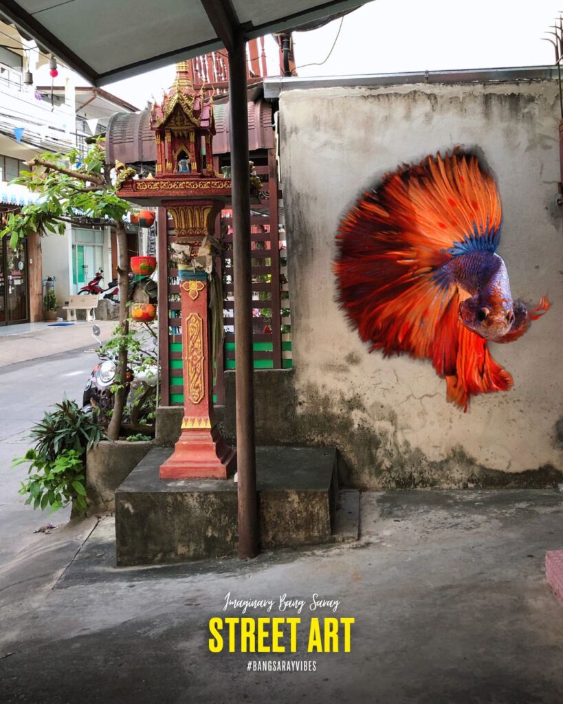 Thai fighting fish street art in charming Old Town of Bang Saray.