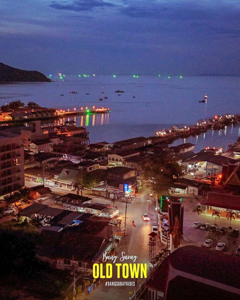 Captivating aerial shot of Bang Saray Old Town at night, showcasing its timeless charm under a starry sky.